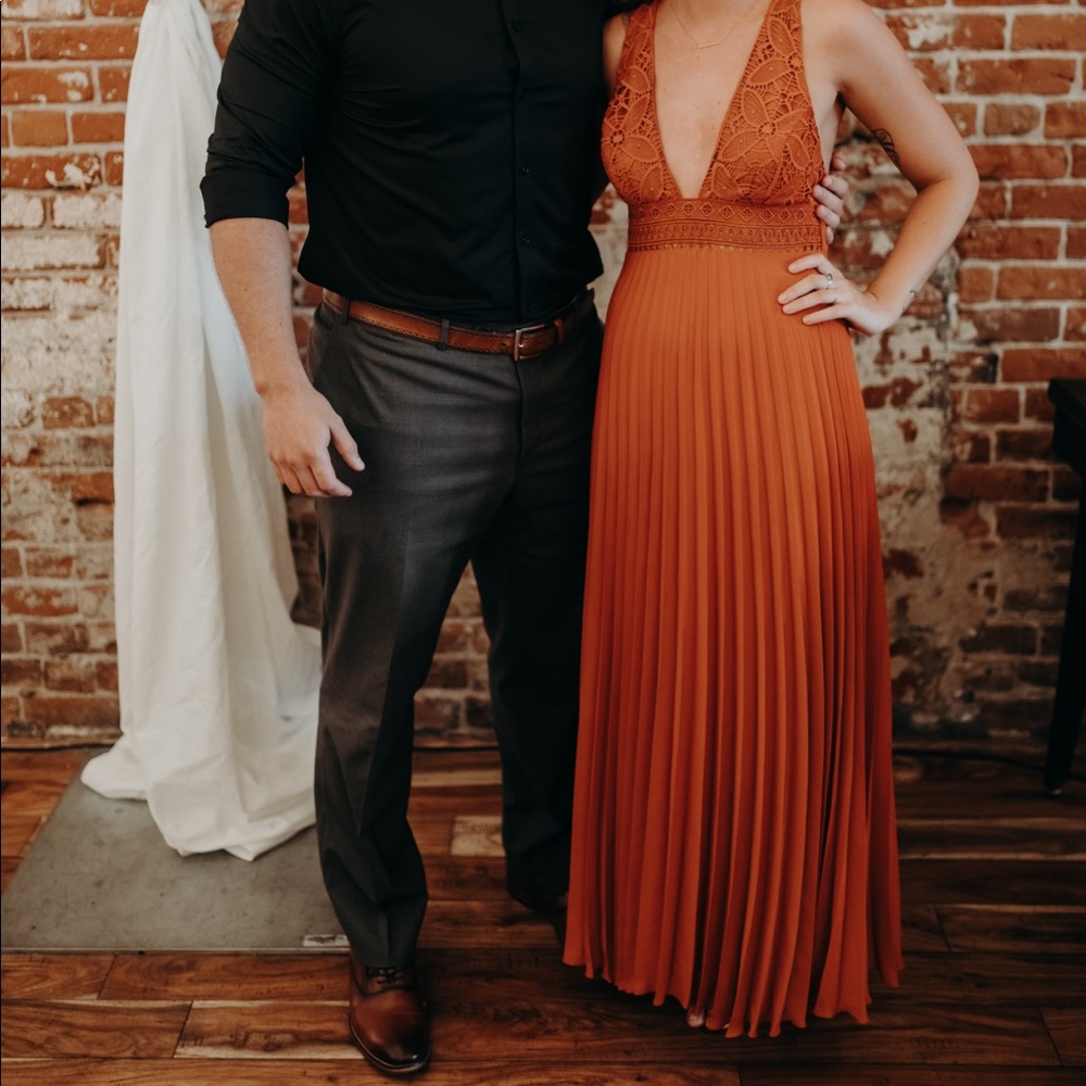 Rust colored plunge-neck dress